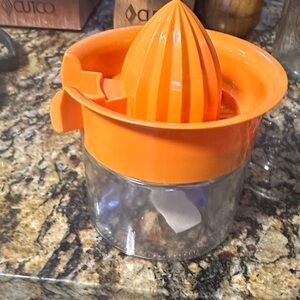 Orange Manual Citrus Juicer. NWOT - never used
